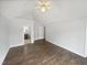 Main bedroom with high ceiling and ensuite bathroom at 709 Pineburr Pl, Durham, NC 27703