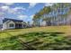 Large backyard with grassy area and privacy fence at 75 Sorrel Dr, Franklinton, NC 27525