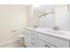 Bathroom boasts double sinks, modern vanity, and shower/tub combo at 8065 Gilano Dr, Raleigh, NC 27603