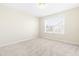 Bright bedroom with neutral walls and carpet flooring at 8065 Gilano Dr, Raleigh, NC 27603