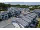 Aerial view of townhome community, showcasing building exteriors at 8610 Brushfoot Way # 106, Raleigh, NC 27616