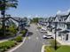 Aerial view of townhouses and parking area at 8610 Brushfoot Way # 106, Raleigh, NC 27616