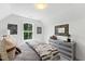 Well-lit bedroom with ample storage and a window with a view at 8610 Brushfoot Way # 106, Raleigh, NC 27616