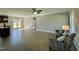 Open living room with hardwood floors and access to kitchen at 873 Gilbert Rd, Benson, NC 27504