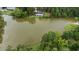 Aerial view of a waterfront property with a renovated home at 889 Burlington Rd, Roxboro, NC 27573