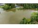 Aerial view of a waterfront property with a renovated home at 889 Burlington Rd, Roxboro, NC 27573