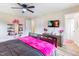 Bedroom with a double bed and pink accents at 889 Burlington Rd, Roxboro, NC 27573