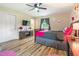 Bedroom with a double bed and pink accents at 889 Burlington Rd, Roxboro, NC 27573