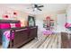 Bedroom with a double bed and pink accents at 889 Burlington Rd, Roxboro, NC 27573