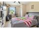 Bedroom with a bed, TV, and fishing decor at 889 Burlington Rd, Roxboro, NC 27573