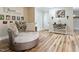 Bright entryway with hardwood floors and decorative console table at 889 Burlington Rd, Roxboro, NC 27573