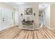Spacious entryway with hardwood floors and two white doors at 889 Burlington Rd, Roxboro, NC 27573