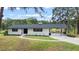 Newly renovated ranch home with carport and pond view at 889 Burlington Rd, Roxboro, NC 27573