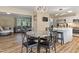 Open concept kitchen and dining area with modern finishes at 889 Burlington Rd, Roxboro, NC 27573