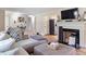 Living room features a fireplace and ample natural light at 889 Burlington Rd, Roxboro, NC 27573