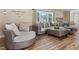 Spacious living room with comfortable seating and hardwood floors at 889 Burlington Rd, Roxboro, NC 27573