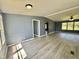 Spacious living room with light gray walls and wood-look flooring at 9199 Virgilina Road Rd, Roxboro, NC 27574