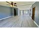 Open living area with gray walls and wood-look floors at 9199 Virgilina Road Rd, Roxboro, NC 27574