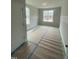 Unfinished bedroom showing the space and window locations at 9349 Kitchin Farms Way # 463, Wake Forest, NC 27587