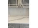A kitchen countertop with herringbone-patterned subway tile at 9349 Kitchin Farms Way # 463, Wake Forest, NC 27587