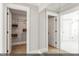 Hallway view featuring access to a closet with shelving for optimal storage at 9349 Kitchin Farms Way # 463, Wake Forest, NC 27587