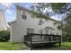 Backyard view of home with deck at 108 Cross Oaks Pl, Holly Springs, NC 27540
