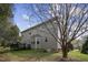 Backyard view of home with deck at 108 Cross Oaks Pl, Holly Springs, NC 27540
