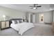 Large bedroom with plush carpeting, ample space, and natural light for relaxation at 108 Cross Oaks Pl, Holly Springs, NC 27540