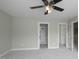 Bedroom with carpet, neutral paint and doors to other rooms at 108 Cross Oaks Pl, Holly Springs, NC 27540