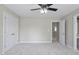 Bedroom with neutral paint, carpet, 2 closets and access to bathroom at 108 Cross Oaks Pl, Holly Springs, NC 27540