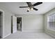 Bedroom with carpet, neutral paint and doors to other rooms at 108 Cross Oaks Pl, Holly Springs, NC 27540