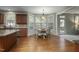 Bright breakfast nook featuring a bay window and a cozy dining set for casual meals at 108 Cross Oaks Pl, Holly Springs, NC 27540