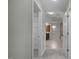 Hallway with access to a large closet and a luxurious bathroom at 108 Cross Oaks Pl, Holly Springs, NC 27540