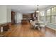 Spacious eat-in kitchen features hardwood floors, an island, and stainless steel appliances at 108 Cross Oaks Pl, Holly Springs, NC 27540