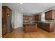 Modern kitchen with granite countertops, stainless steel appliances, and a central island at 108 Cross Oaks Pl, Holly Springs, NC 27540