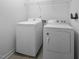 Utility/laundry room with a washer and dryer at 108 Cross Oaks Pl, Holly Springs, NC 27540