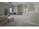 Open and spacious loft with seating and ceiling fan, perfect for entertaining at 108 Cross Oaks Pl, Holly Springs, NC 27540