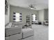 Inviting loft area with comfortable seating, striped curtains, and soft natural light at 108 Cross Oaks Pl, Holly Springs, NC 27540