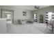 Bright and airy loft area featuring comfortable seating and stylish decor at 108 Cross Oaks Pl, Holly Springs, NC 27540