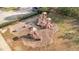 Aerial view of a playground with multiple slides and play structures on a mulch ground at 108 Cross Oaks Pl, Holly Springs, NC 27540