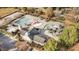 Aerial view of a community pool featuring a slide, umbrellas, and various water features at 108 Cross Oaks Pl, Holly Springs, NC 27540