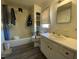 Clean bathroom with a bathtub, toilet, and vanity at 1124 S Church St, Rocky Mount, NC 27803