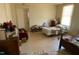 Small bedroom with a bed and some personal items at 1124 S Church St, Rocky Mount, NC 27803