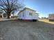 Side view of a white house with a yard at 1124 S Church St, Rocky Mount, NC 27803