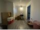 A hallway with boxes and a baby bassinet at 1124 S Church St, Rocky Mount, NC 27803