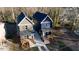 Two-story new construction homes with a shared driveway at 1127 Elmo St, Durham, NC 27701