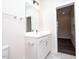 Bathroom with white vanity and marble countertops at 1127 Elmo St, Durham, NC 27701