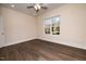 Bedroom with hardwood floors and a large window at 1127 Elmo St, Durham, NC 27701