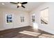 Bright living room with hardwood floors and neutral walls at 1127 Elmo St, Durham, NC 27701