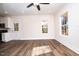 Spacious living area with hardwood floors and access to kitchen at 1129 Elmo St, Durham, NC 27701